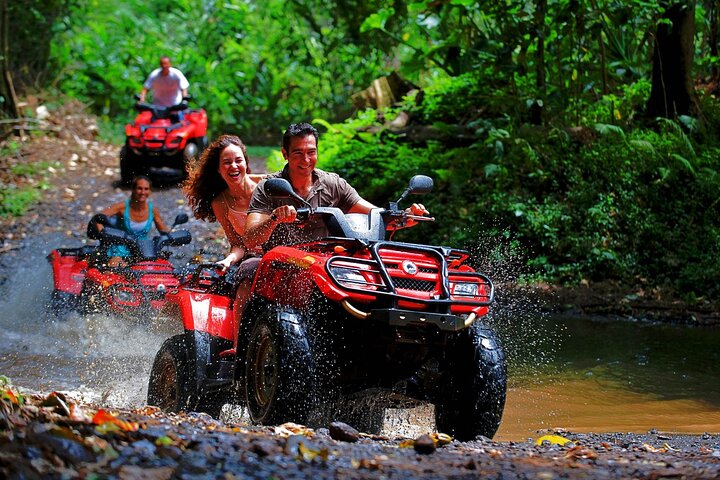 People riding ATV Quad