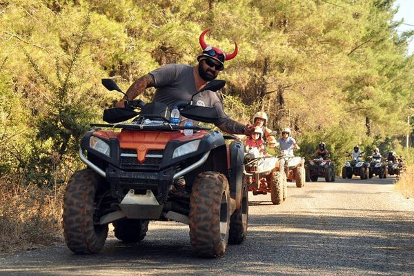People riding ATV Quad