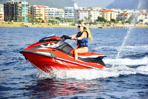 Girl riding jet ski in Alanya