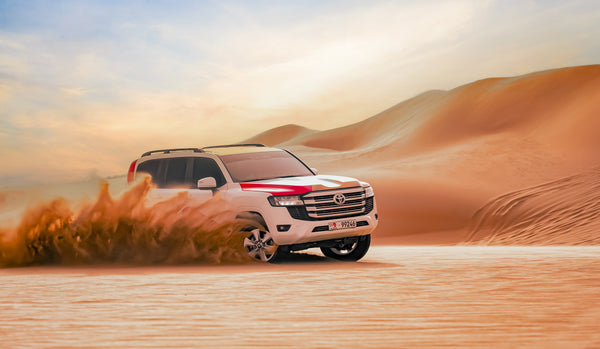 Air-conditioned 4WD vehicle in desert