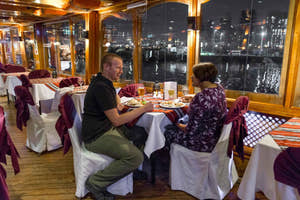Couple having dinner in Dhow Cruise
