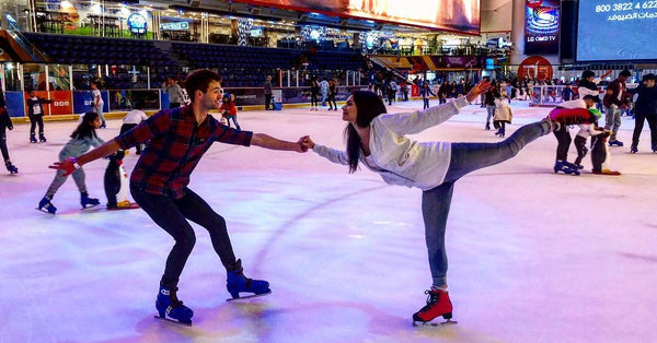 Couple skating in ice rink dubai