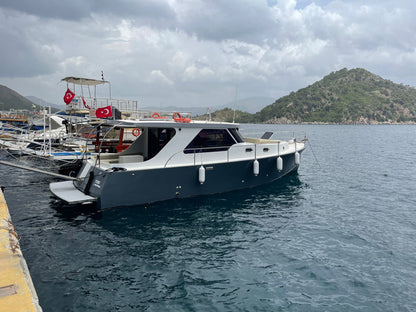 Marmaris Private Yacht Tour with BBQ Lunch, Unlimited Soft Drinks & Roundtrip Transfer