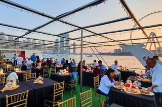 Xclusive Dinner Cruise in Dubai, specifically on a luxurious yacht in Dubai Marina. 