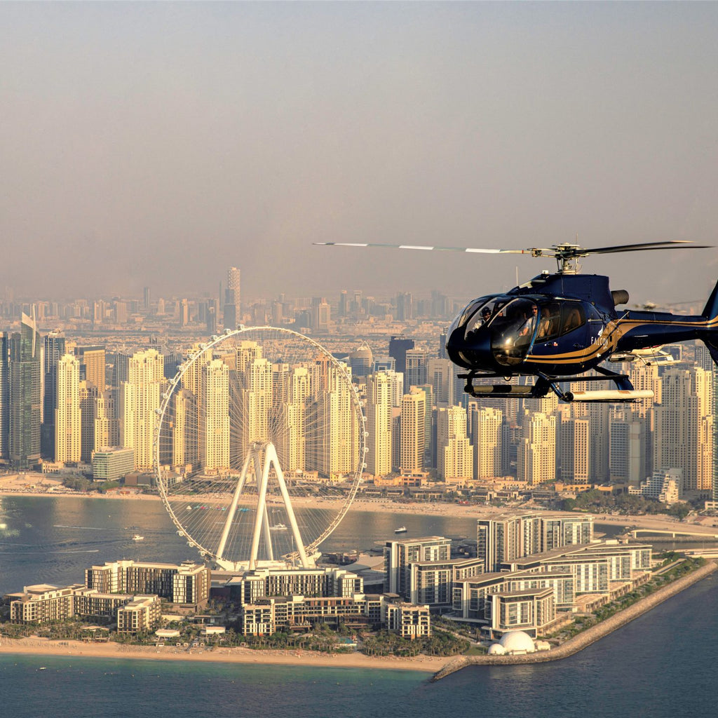 The prominent Ferris wheel in the foreground is Ain Dubai, one of the world's largest and a significant landmark in Dubai. 
