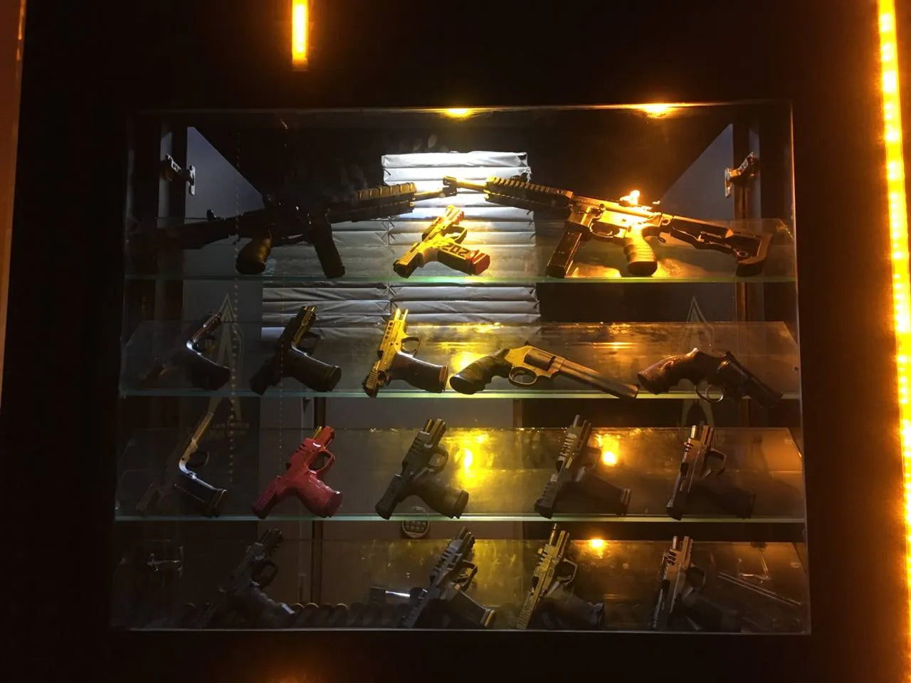 Guns are displayed in a gun rack