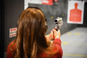 Girl shooting a gun