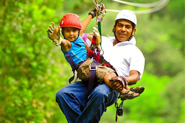 A father and son enjoying the zipline