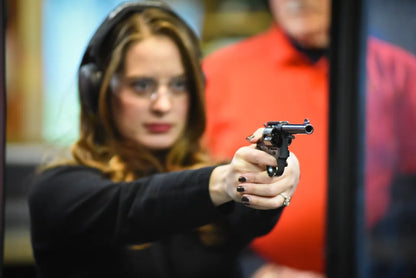 Girl shooting a gun
