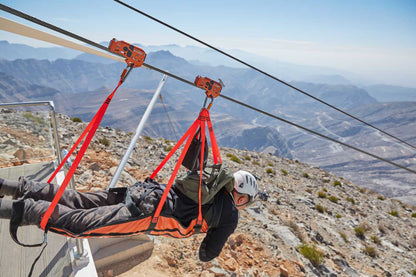 Man riding Jebel Jais zipline