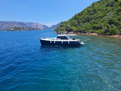 Marmaris Private Yacht Tour with BBQ Lunch, Unlimited Soft Drinks & Roundtrip Transfer