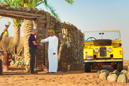 Dubai Heritage Safari in Vintage Land Rover With Sunset Falcon show, Camel Ride,4-Course Arabic Dinner & Shisha