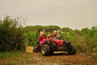 People driving Buggy