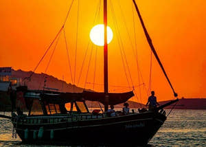 Boat cruising during sunset