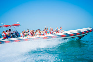People Riding "Love Boats" speedboat 