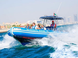 Tourists enjoying Dubai Xclusive Speed Boat Tour