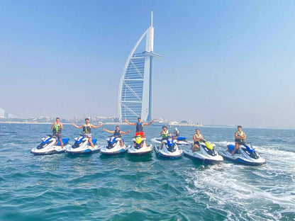 People riding jet ski