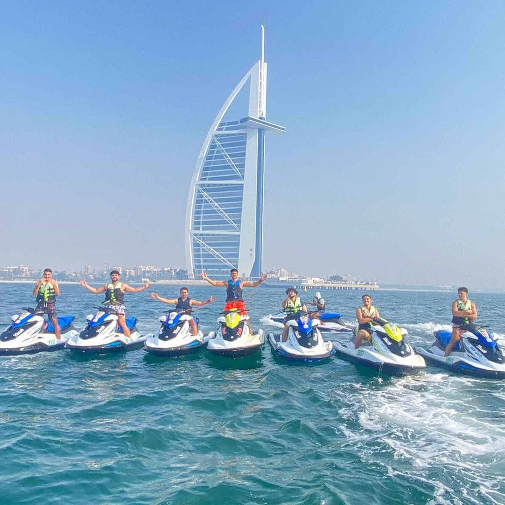 People riding jet ski