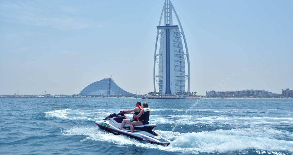 Couple enjoying a jet ski tour in Dubai
