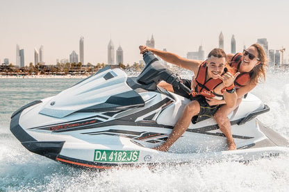 Couple enjoying a jet ski tour in Dubai