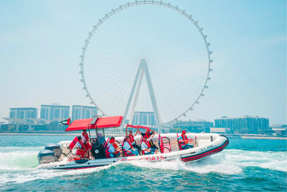 Love Boats" speed boat tour in Dubai, with the iconic Ain Dubai Ferris wheel