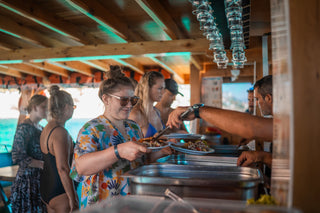 Guests having lunch on a boat