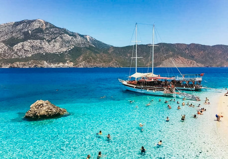 A modern and air-conditioned transfer boat ready to transport guests to the Suluada tour starting point