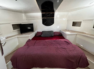 Bed inside of Queen VIP Yacht