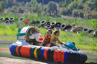 People driving Hovercraft