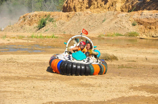 People driving Hovercraft
