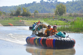 People driving Hovercraft