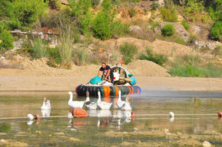 People driving Hovercraft