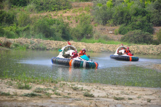 People driving Hovercraft