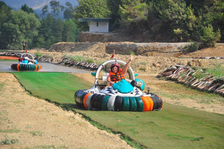 People driving Hovercraft