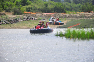 People driving Hovercraft
