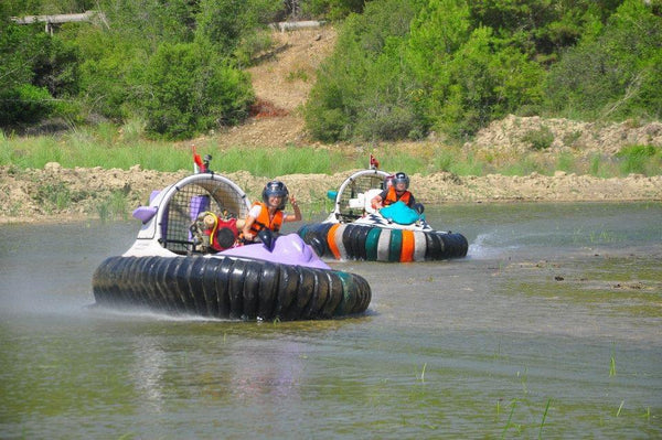People driving Hovercraft