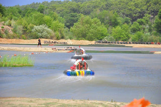 People driving Hovercraft