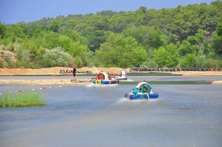 People driving Hovercraft