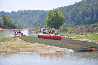 People driving Hovercraft