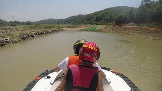 People driving Hovercraft