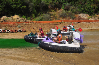 People driving Hovercraft