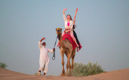 Dubai Caravanserai 5-Star Buffet Dinner, Desert Safari, Dune Bashing, Camel Riding, & Entertainment With Private Car