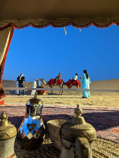 Dubai Caravanserai 5-Star Buffet Dinner, Desert Safari, Dune Bashing, Camel Riding, & Entertainment With Private Car