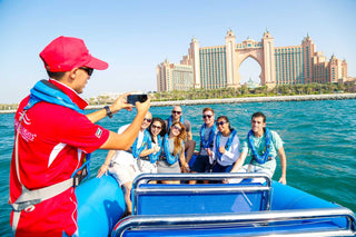 Tourists enjoying Dubai Xclusive Speed Boat Tour