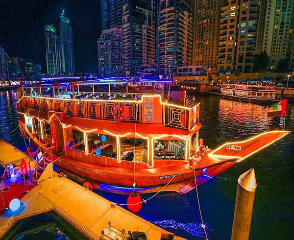 Dubai Dhow Cruise Buffet Dinner at Creek with Live Entertainment and Dubai Marina Views and Landmarks - Tripventura