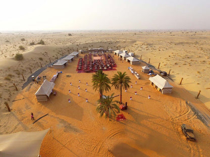 Dubai 4-Seater Dune Buggy with Desert Safari Tour, Camel Riding, Sand Boarding, Live Entertainment, BBQ Dinner With Private Car
