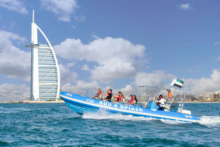 Tourists enjoying the Dubai Xclusive Speed Boat Tour