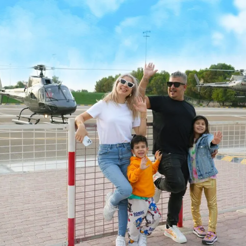 Family in front of Helicopters