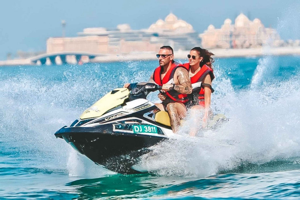 Couple enjoying a jet ski tour in Dubai
