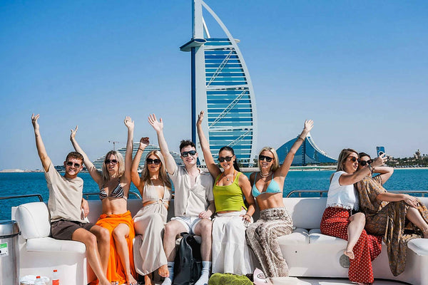 luxury yacht tour in Dubai, showcasing the iconic Burj Arab